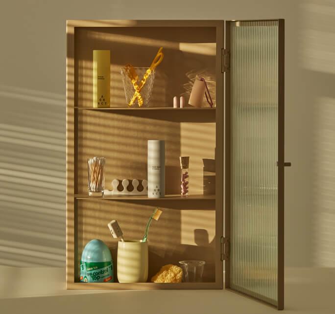 An open Cabinet with Agency bottles inside